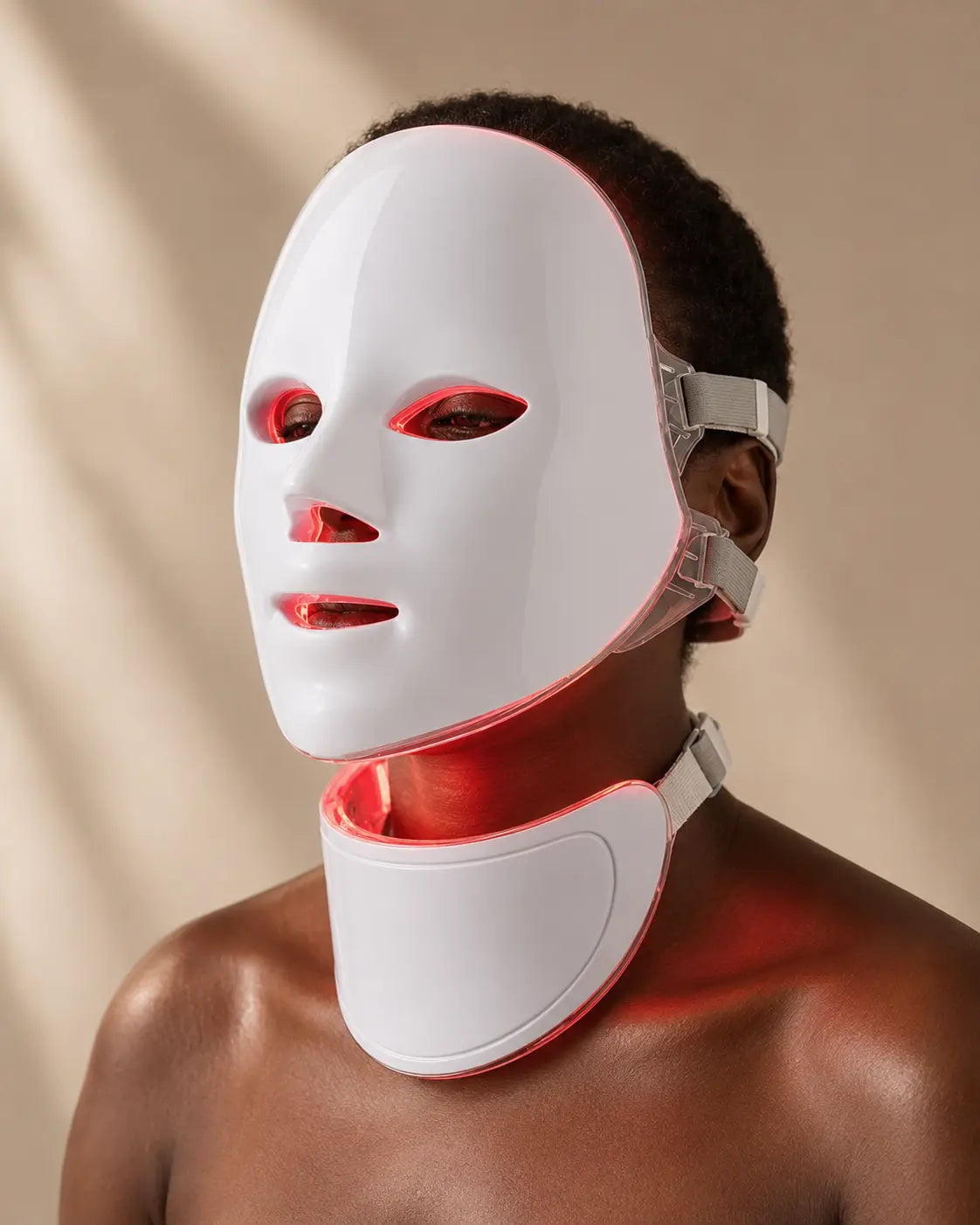 Black adult model wearing The Light face mask and neck mask