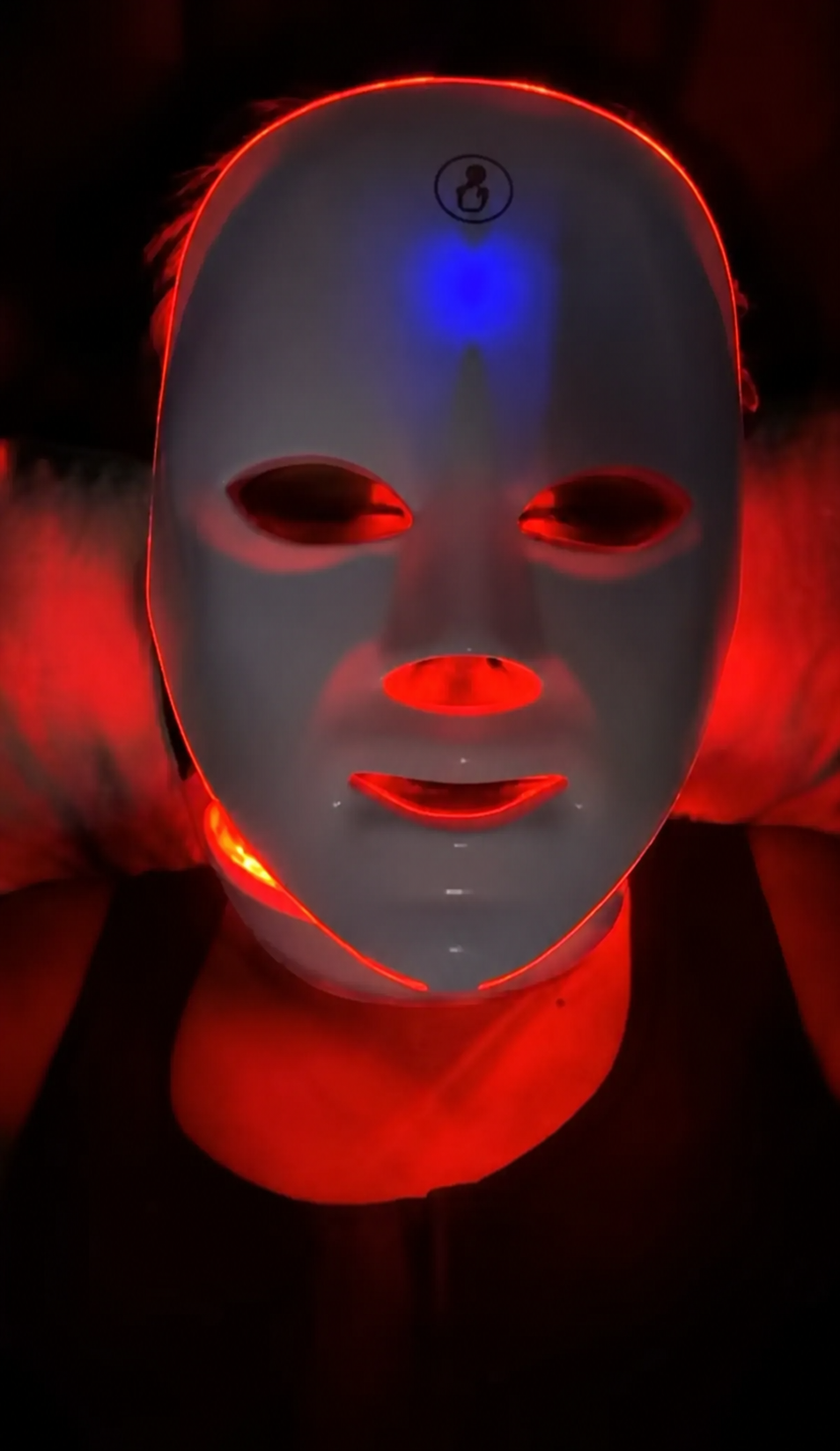 Customer photo wearing the LED mask illuminated in red